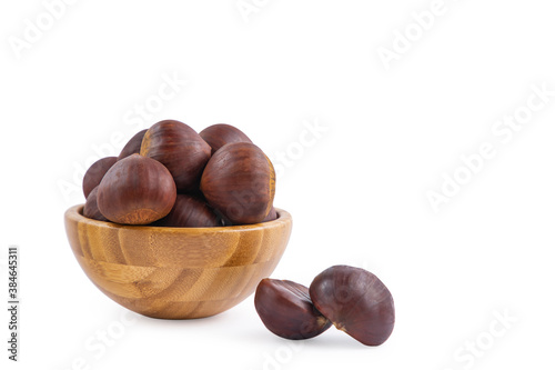 Fresh Chestnuts fruit isolated in wooden bowl on white background