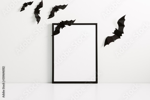 Halloween holiday concept. Photo frame, halloween decorations on white background. Front view, copy space photo