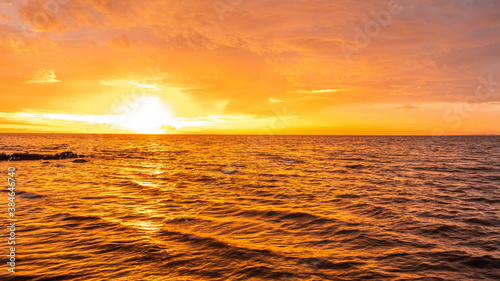 Fototapeta Naklejka Na Ścianę i Meble -  Golden sunst over sea - minimalist seascape with copy space