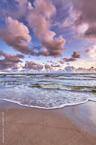 Fototapeta Naklejka Na Ścianę i Meble -  colorful sunrise on beach of baltic sea in germany