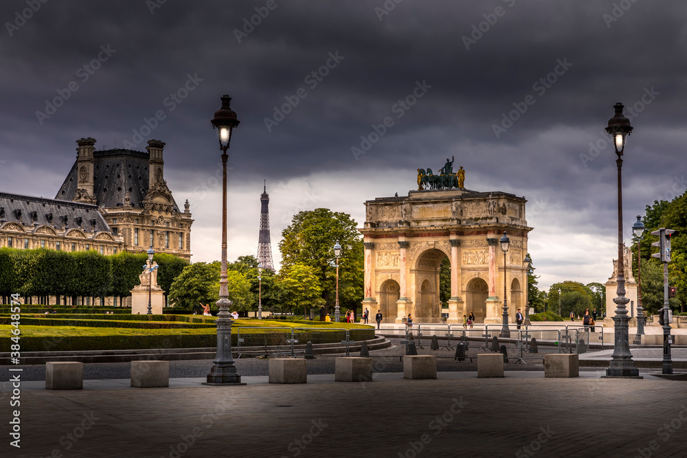 Fototapeta premium Paris, France - September 29, 2020: Louvre museum and carrousel in Paris . Louvre museum is one of the world's largest museums with more than 8 million visitors each year.