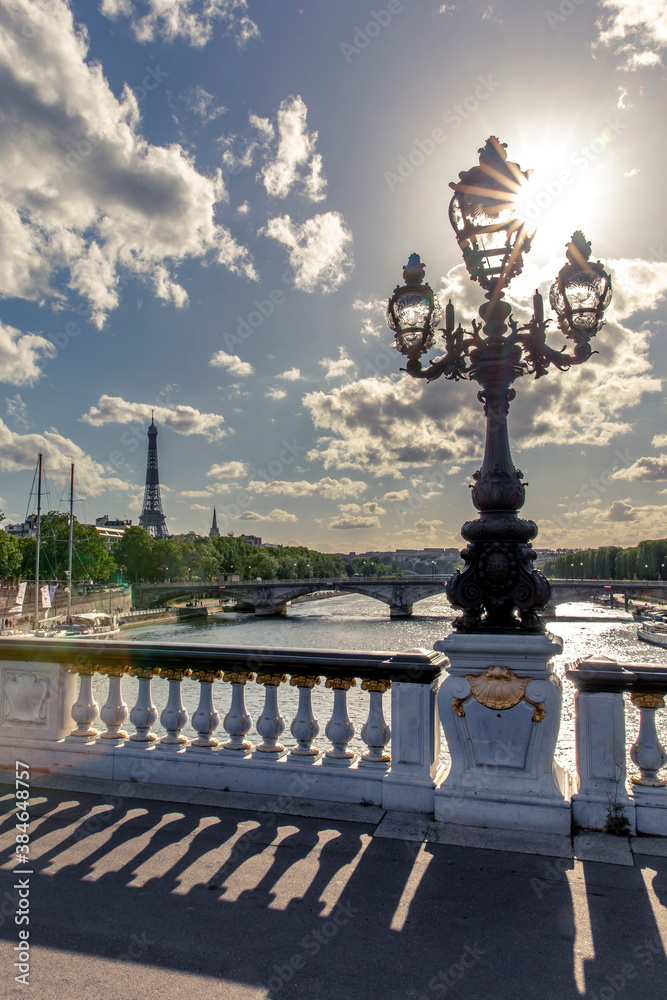 Paris, France - May 23, 2020: Famous street lantern on the Alexandre III Bridge in Paris