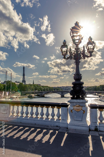 Paris, France - May 23, 2020: Famous street lantern on the Alexandre III Bridge in Paris © JEROME LABOUYRIE