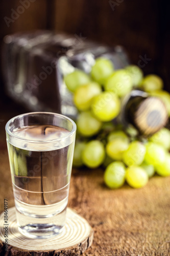 Glass of brandy based on grapes, called bagaceira in Portugal and in Italy Grappa or Graspa photo