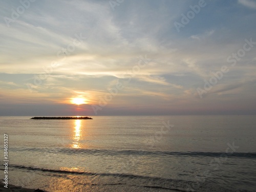 Sunset Reflecting on the Beach 