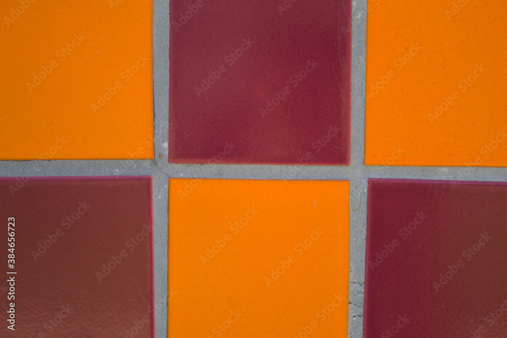 Fototapeta premium Parede de azulejos com cor laranja e vermelho