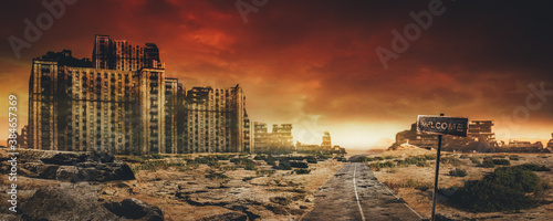 Evening post apocalyptic background image of desert city wasteland with abandoned and destroyed buidings, cracked road and sign.