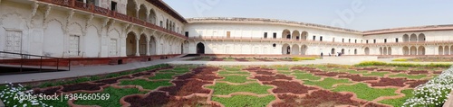 Agra, India- March 2018: Panoramic view of the magnificient architecture of Agra Fort with landscaped gardens. photo