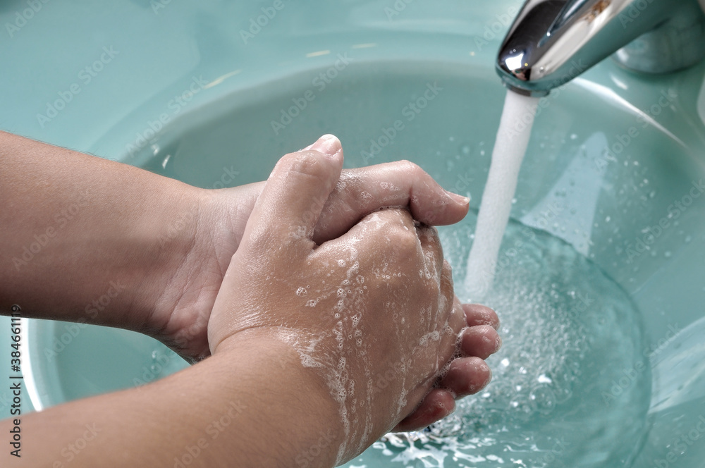 Fototapeta premium Washing Hands During the Covid-19 Pandemic