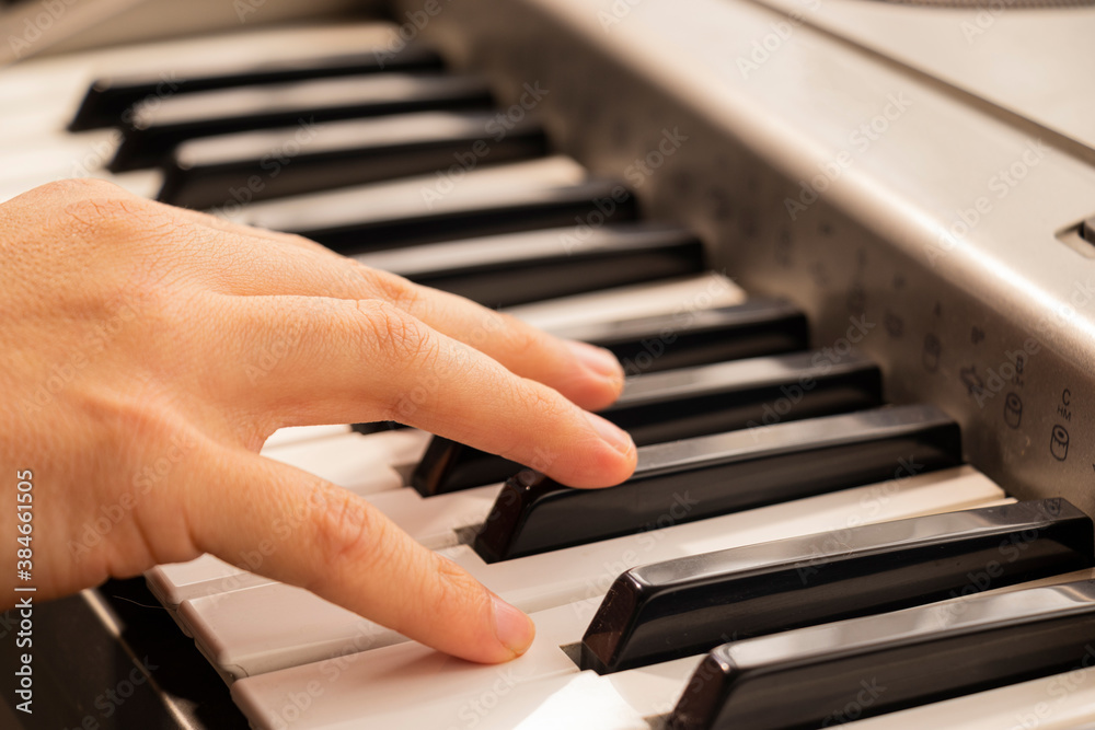 hands of a child playing piano hands of a child playing piano