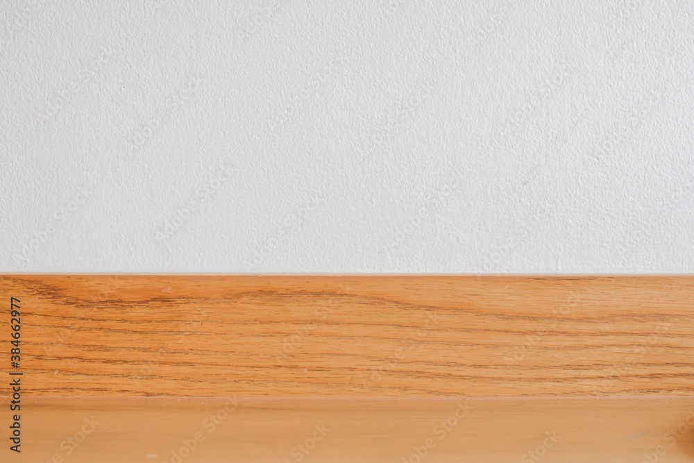Abstract texture and background of wooden and white cement wall in background. Old concrete wall painted in half white and brown color. Abstract texture and background of wooden and white cement wall in background. Old concrete wall painted in half white and brown color.