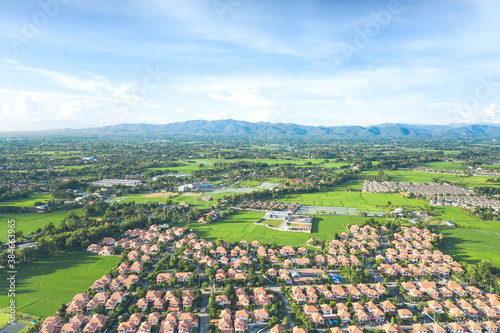 Housing subdivision or housing development. Also call tract housing. Large tract of land that divided into smaller. Business process by developer and builder. Aerial view in Chiang Mai of Thailand.