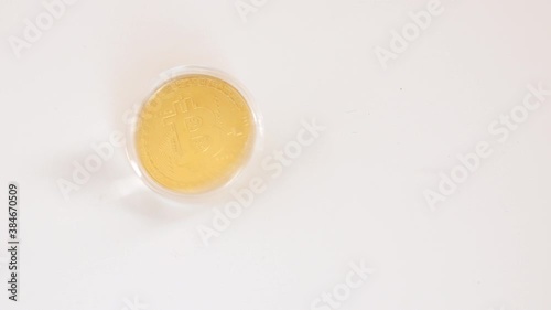 Bitcoin spinning on table