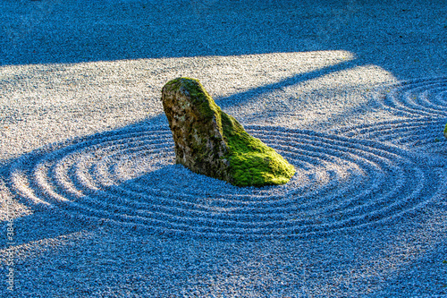Canvas Print Zen garden with a large stone in the rock garden
