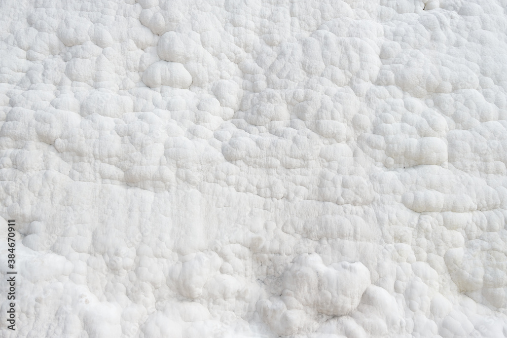 White calcium deposits on the slopes of Pamukkale, Turkey White calcium deposits on the slopes of Pamukkale, Turkey