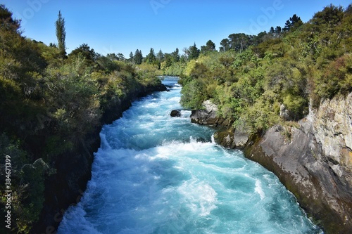 New Zealand  normally 100m wide Waikato River continues like a narrow 15m wide gorge. Huka Falls is the phenomenon of natural hydro power - more than 220  000 litres of water per second.