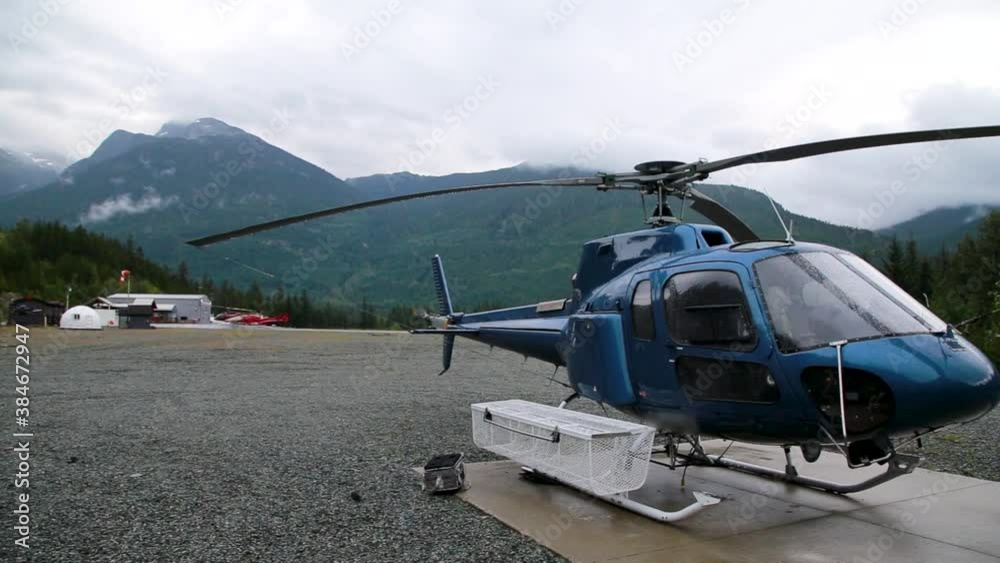 An H125 helicopter at the Green Lake heliport in Whistler, BC. HD 24FPS. An H125 helicopter at the Green Lake heliport in Whistler, BC. HD 24FPS.