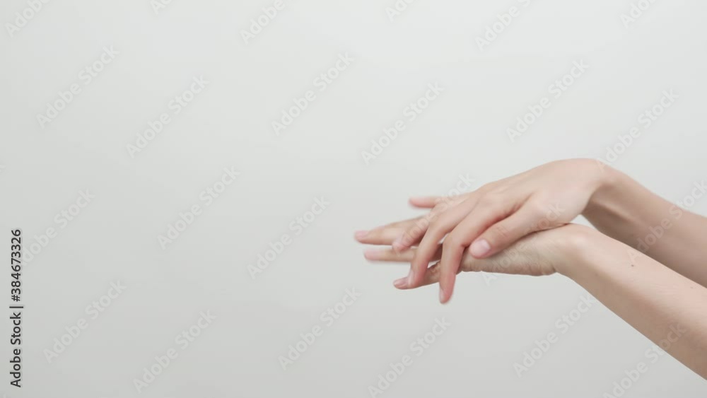 Close up of woman hand holding and applying moisturiser, Body lotion, isolated on white background. Close up of woman hand holding and applying moisturiser, Body lotion, isolated on white background.