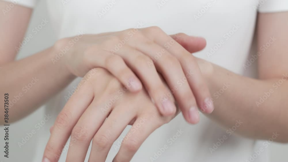 Close up of woman hand holding and applying moisturiser, Body lotion, isolated on white background. Close up of woman hand holding and applying moisturiser, Body lotion, isolated on white background.