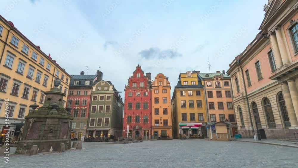 Stockholm Sweden time lapse 4K, city skyline night to day timelapse at Gamla Stan old town and Stortorget