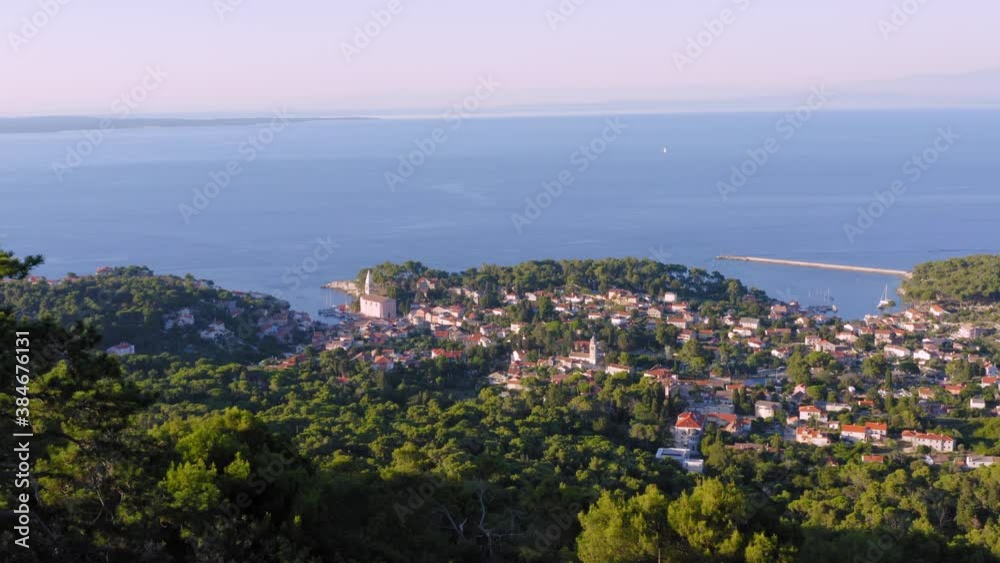 Beautiful aerial view of the city of Mali Losinj surrounded by forest in the coast of Croatia. Beautiful aerial view of the city of Mali Losinj surrounded by forest in the coast of Croatia.