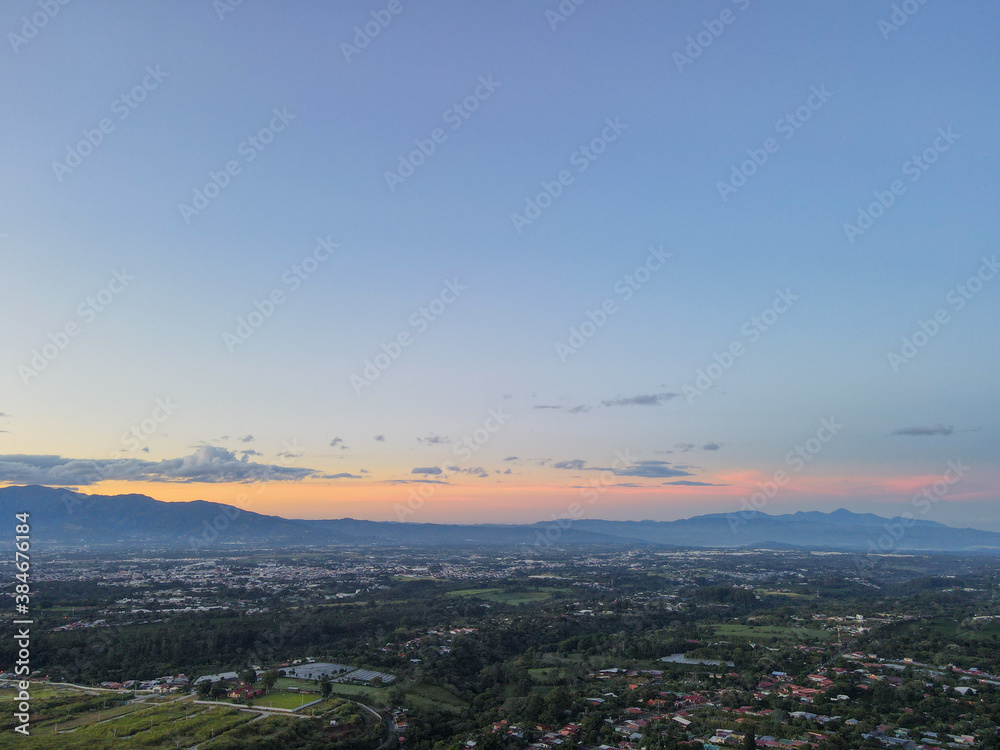 sunset over the city of Alajuela, Costa Rica