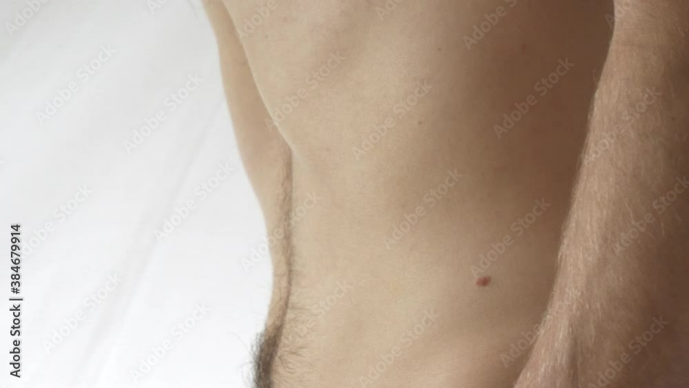 Man performs Abdominal strength Exercise, Vacuum Of Inner Abdomen Man performs Abdominal strength Exercise, Vacuum Of Inner Abdomen