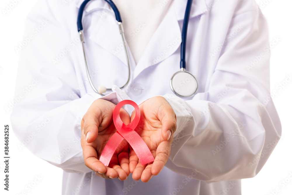 Woman medical doctors in uniform holding support HIV AIDS awareness red ribbon on hands in studio shot isolated on over white background, Healthcare and medicine, World aids day concept Woman medical doctors in uniform holding support HIV AIDS awareness red ribbon on hands in studio shot isolated on over white background, Healthcare and medicine, World aids day concept