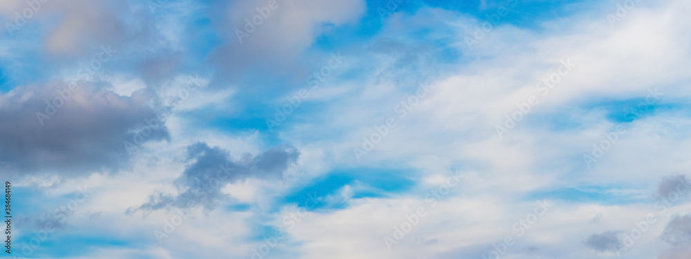 White and gray clouds in the blue sky, panorama of cloudy sky