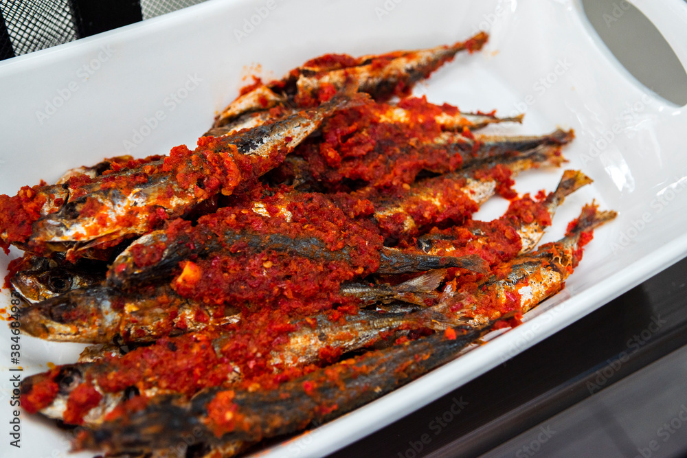 Fried fish with chili sauce Indonesian or Asian food Fried fish with chili sauce Indonesian or Asian food