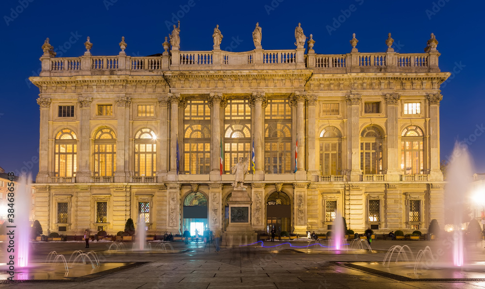 The Carignano Palace is cultural landmark of night Turin in Italy outdoor.