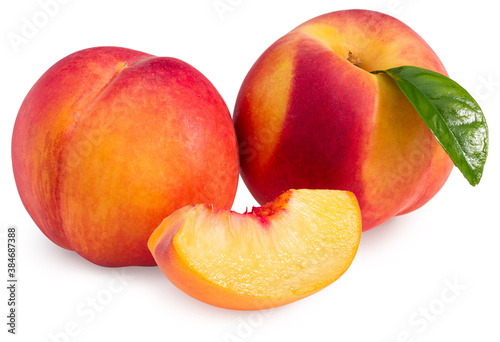 peach fruit with green leaf and slices isolated on white background. full depth of field