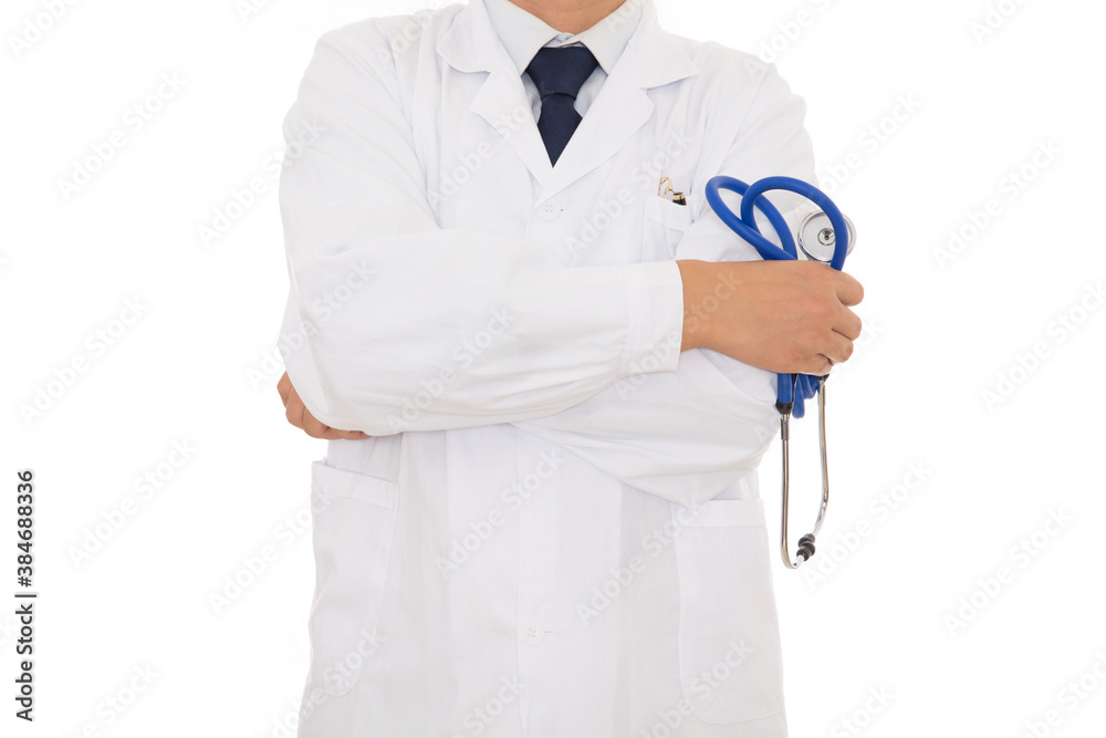 A doctor in a white coat holding a stethoscope in hand standing in front of a white background
