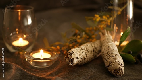 Dried white sage smudge stick, relaxation and aromatherapy. Smudging during psychic occult ceremony, herbal healing, yoga or aura cleaning. Essential incense for esoteric rituals and fortune telling