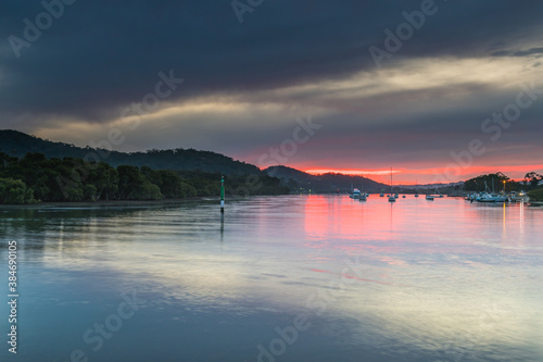 Fototapeta Naklejka Na Ścianę i Meble -  Soft Cloudy Sunrise over the Bay