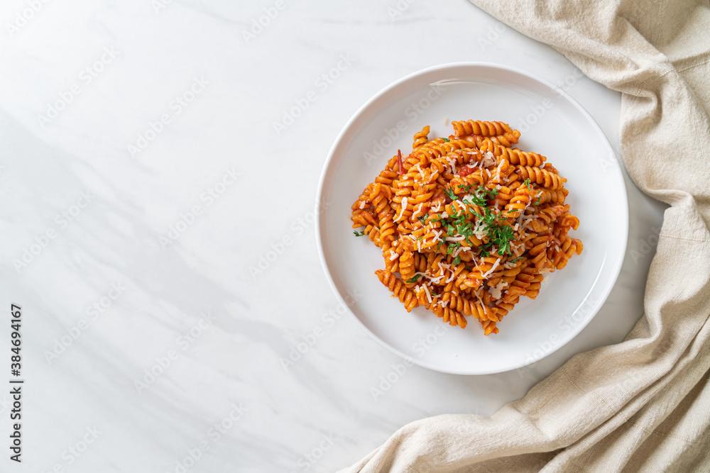 spirali or spiral pasta with tomato sauce spirali or spiral pasta with tomato sauce