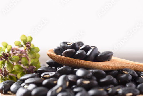 Close up of organic black beans in healthy food concept