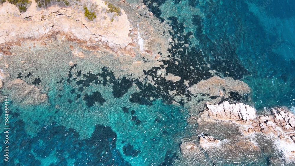 Aerial view of Elba Island. Southern Coastline in summer season. Drone viewpoint. Slow motion.