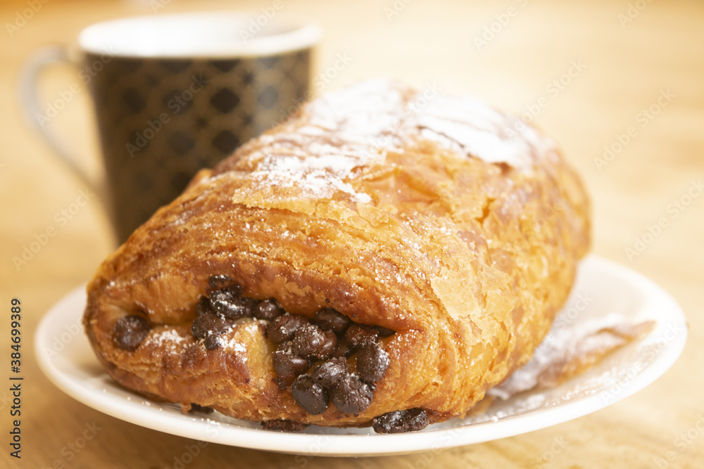 chocolate croissant and espresso chocolate croissant and espresso