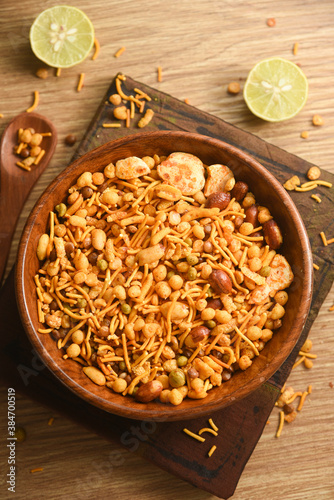 Принти на полотні Traditional indian deep fried salty dish - chivda or mixture or farsan or namkeen made of gram flour and mixed with dry fruits