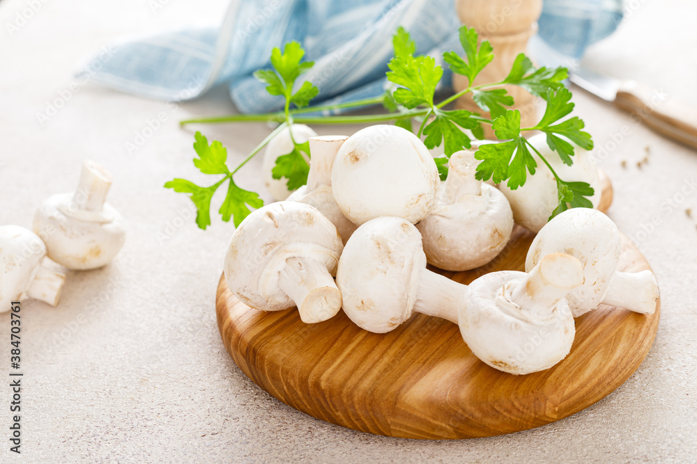 Fresh raw white champignon mushrooms Fresh raw white champignon mushrooms