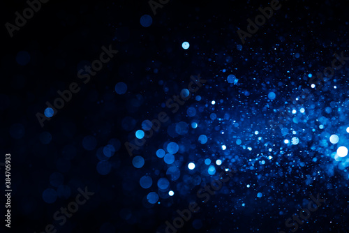 Abstract Blue bokeh defocus glitter blur background.