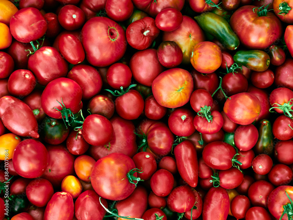 Fresh ripe tomatoes on wooden background. Fresh ripe tomatoes on wooden background.