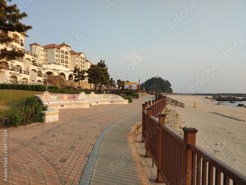 Fototapeta Naklejka Na Ścianę i Meble -  beachroad and beautiful house near seaside, walking view
