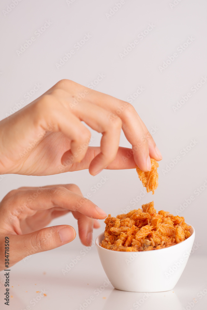 crunchy golden snack in white cup crunchy golden snack in white cup
