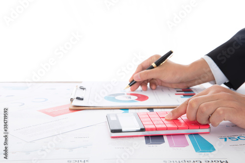 Close-up shot of accountant using calculator to analyze market