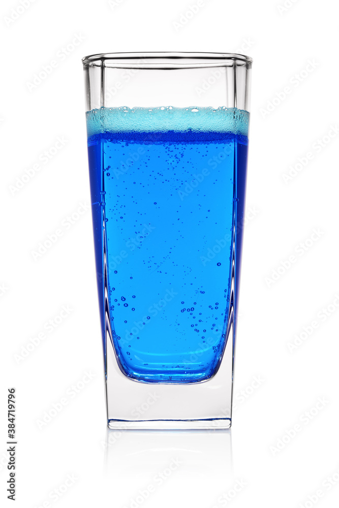 Glass of blue soda soft drink isolated on white background.