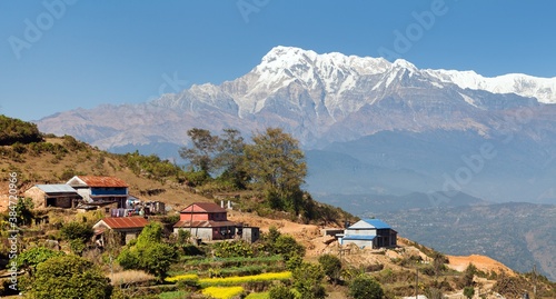 Mount Annapurna and nepalese villege