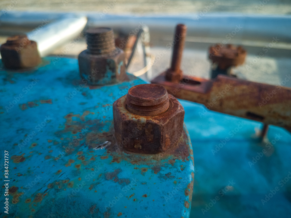 Rusty bolt. Close-up..Corrosive rusted bolt with nut. Grunge industrial construction close up. Rusty bolt. Close-up..Corrosive rusted bolt with nut. Grunge industrial construction close up.