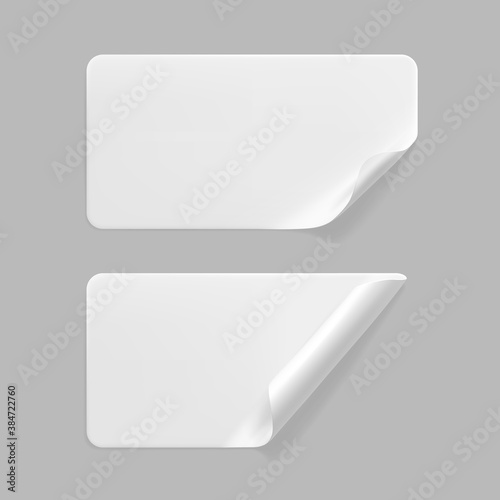 White glued rectangle stickers with curled corners mock up set. Blank white adhesive paper or plastic sticker label with wrinkled and creased effect. Template label tags close up. 3d realistic vector